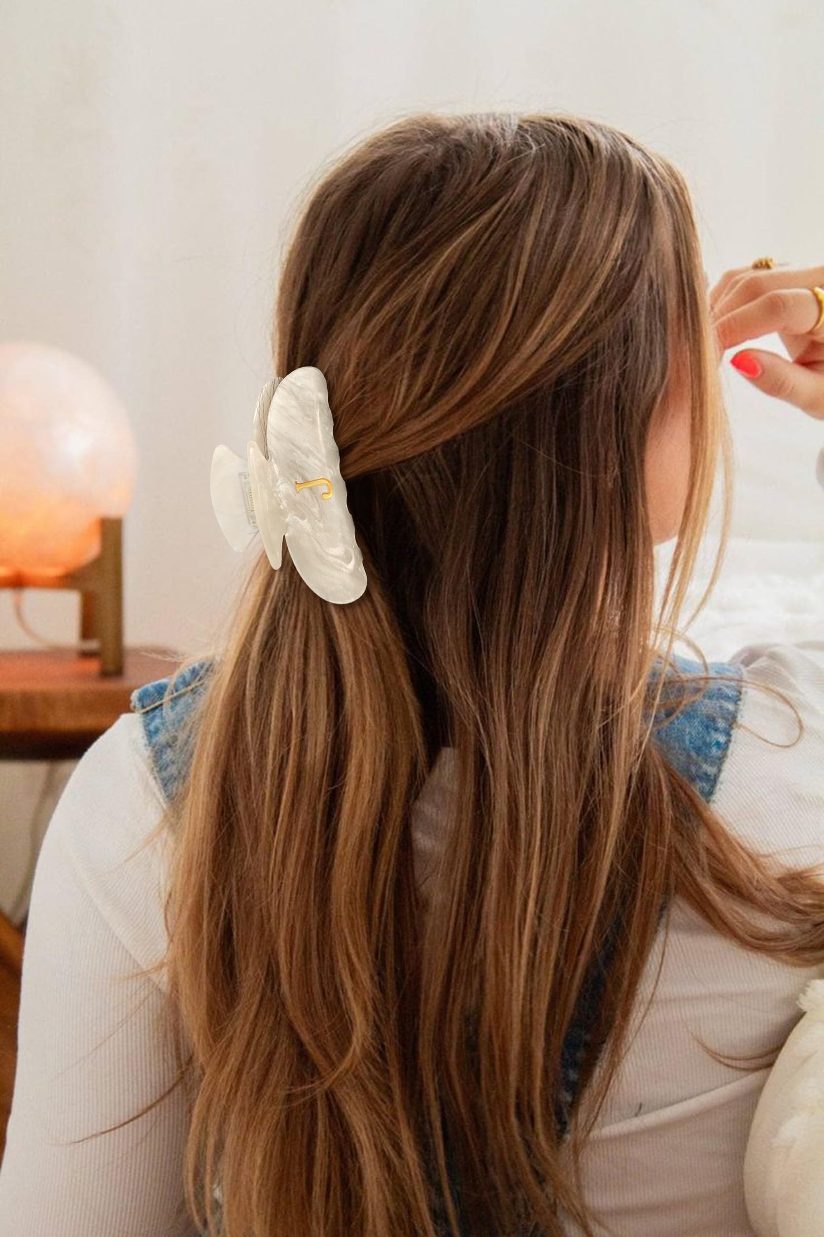 Glorig side profile showing reinforced spring mechanism for secure hold on thick hair