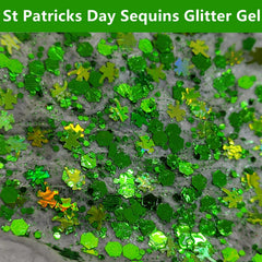 Go Ho glitter topcoat on nails showing shamrock accents and durable shine