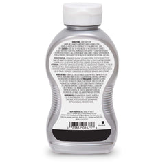 GOJO bottle in use as a worker washes greasy hands for fast soil removal