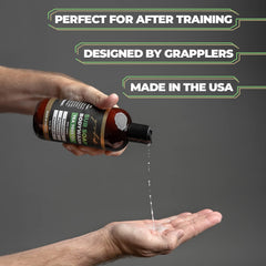 Gold BJJ bottle beside training gear showing compact travel size