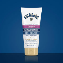 Gold Bond night application on jawline, showing retinol use for firmer-looking skin