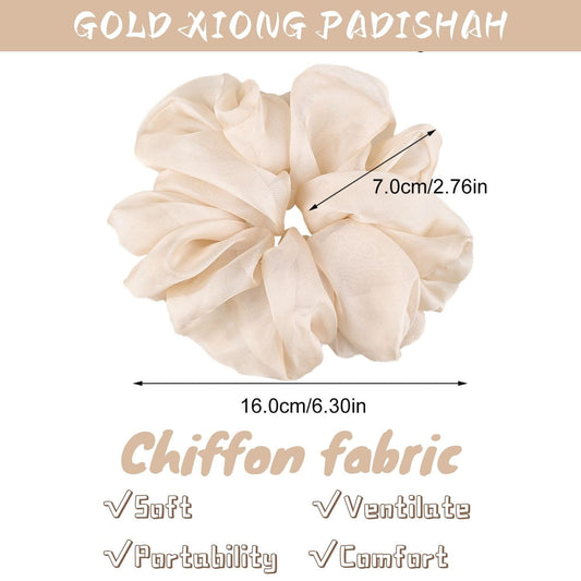 GOLD XIONG PADISHAH chiffon fabric close-up showing smooth texture and gentle grip