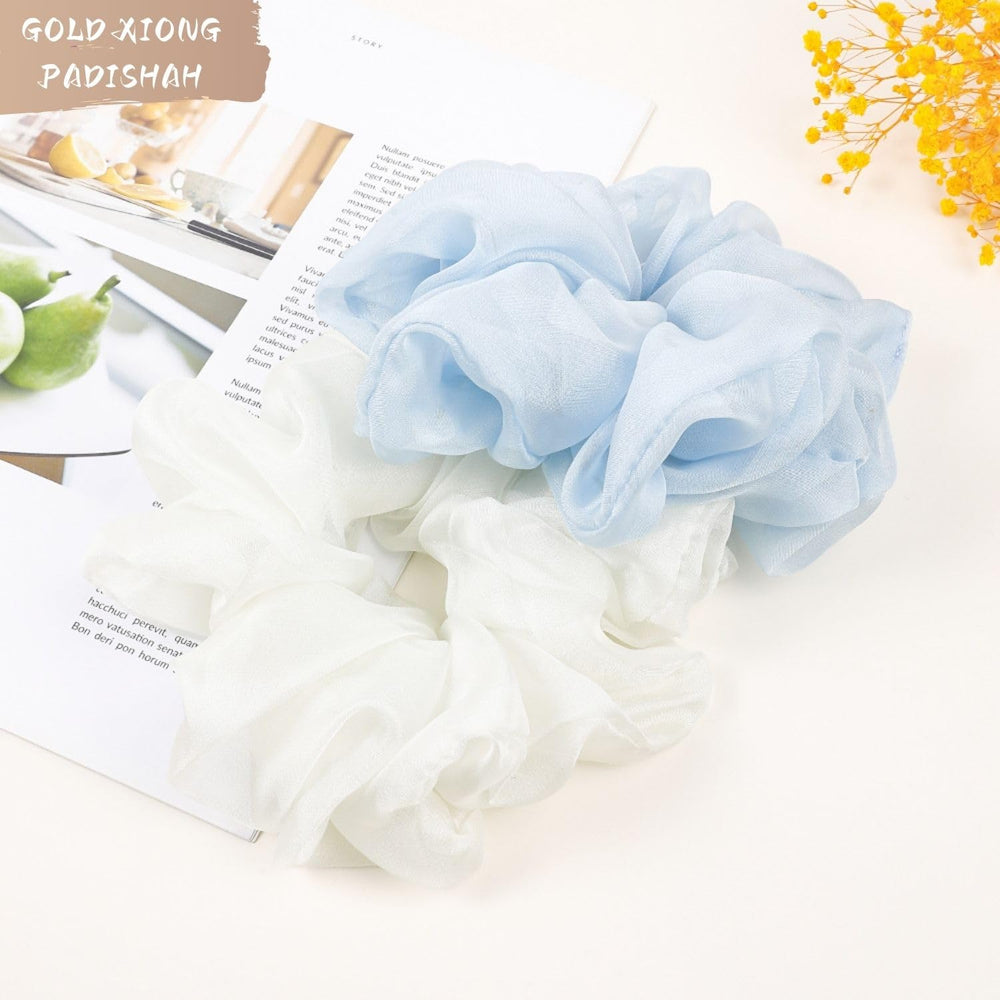 GOLD XIONG PADISHAH assorted color scrunchies neatly arranged for style options