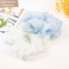 GOLD XIONG PADISHAH assorted color scrunchies neatly arranged for style options