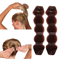 GoldRose bun maker held in hand illustrating small size and travel convenience