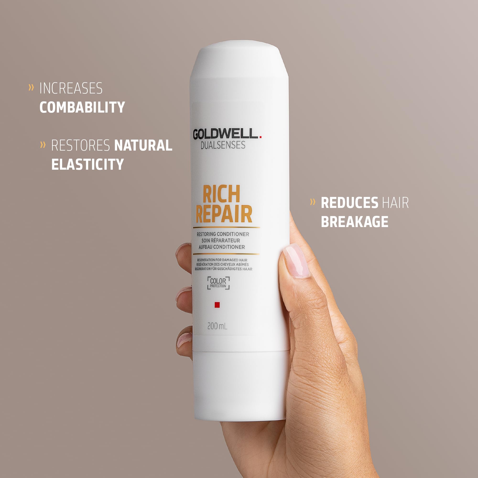 Goldwell Dualsenses creamy conditioner texture on hand showing rich moisturizing benefit