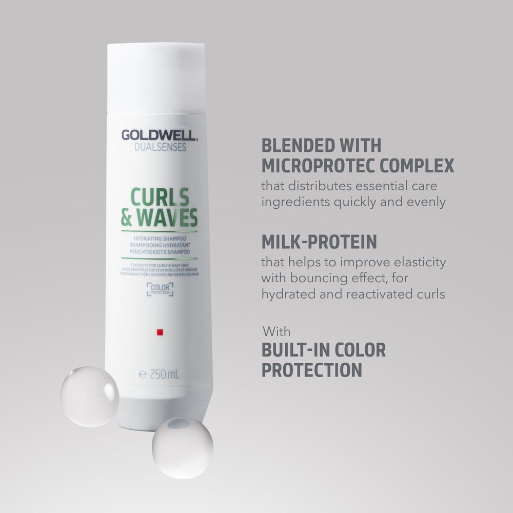 Goldwell 1L pump bottle beside a hand for scale and convenient refill benefit