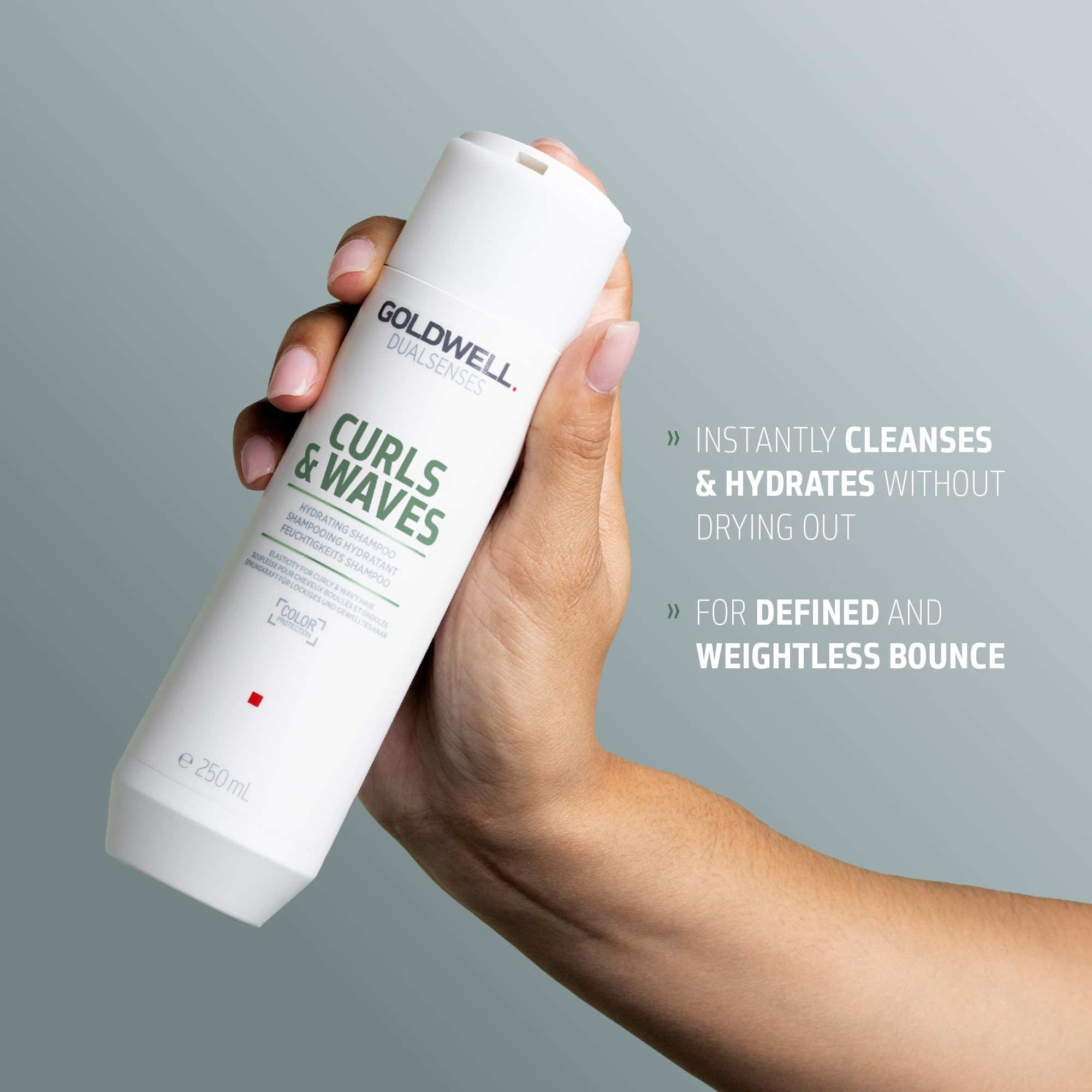 Close-up foam texture of Goldwell shampoo demonstrating gentle cleansing benefit