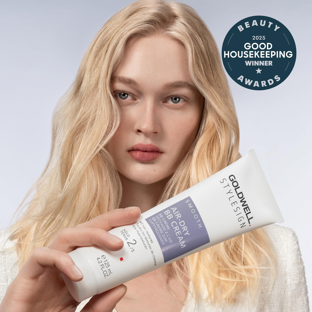 Goldwell cream texture on hand demonstrating lightweight spreadability benefit