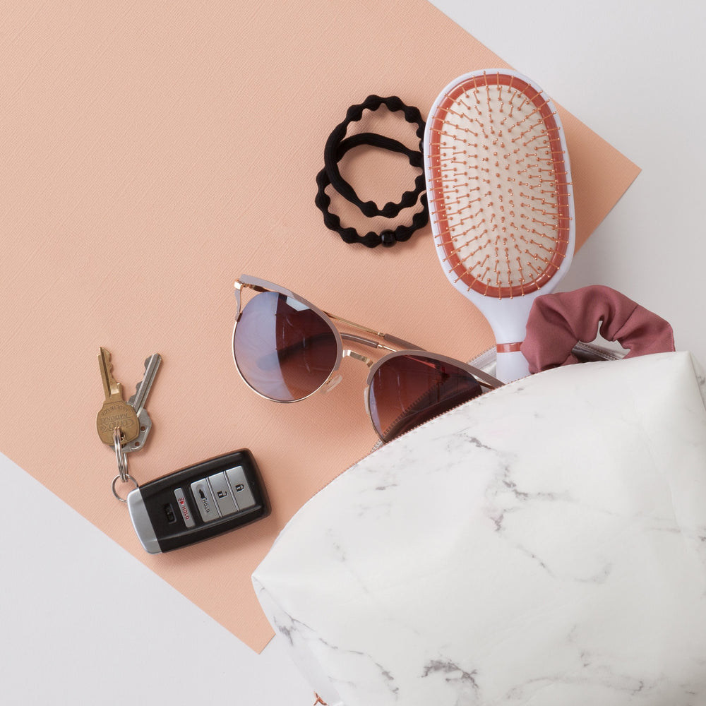 GOODY elastic in mirror-ready styling for polished look and everyday convenience benefit