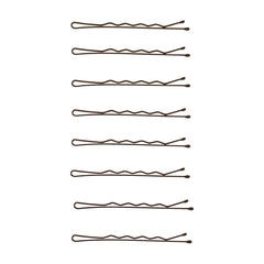 Goody pins next to a ruler for scale to show quantity and compact storage
