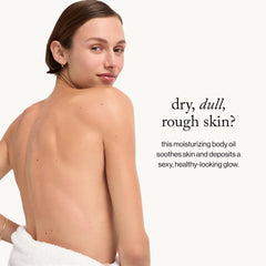 goop body oil next to ruler to show 4 fl oz size for travel convenience
