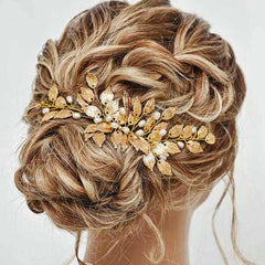 GORAIS front view gold wedding hair comb showing elegant leaves and pearls for bridal sparkle