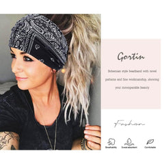 GORTIN headband worn by model at beach showing secure, sweat-wicking benefit
