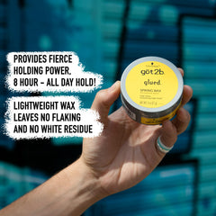 Close-up of Got2B wax on fingertip highlighting strong grip benefit