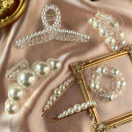 GQLV front packaging showing six pearl hair accessories and gift-ready box