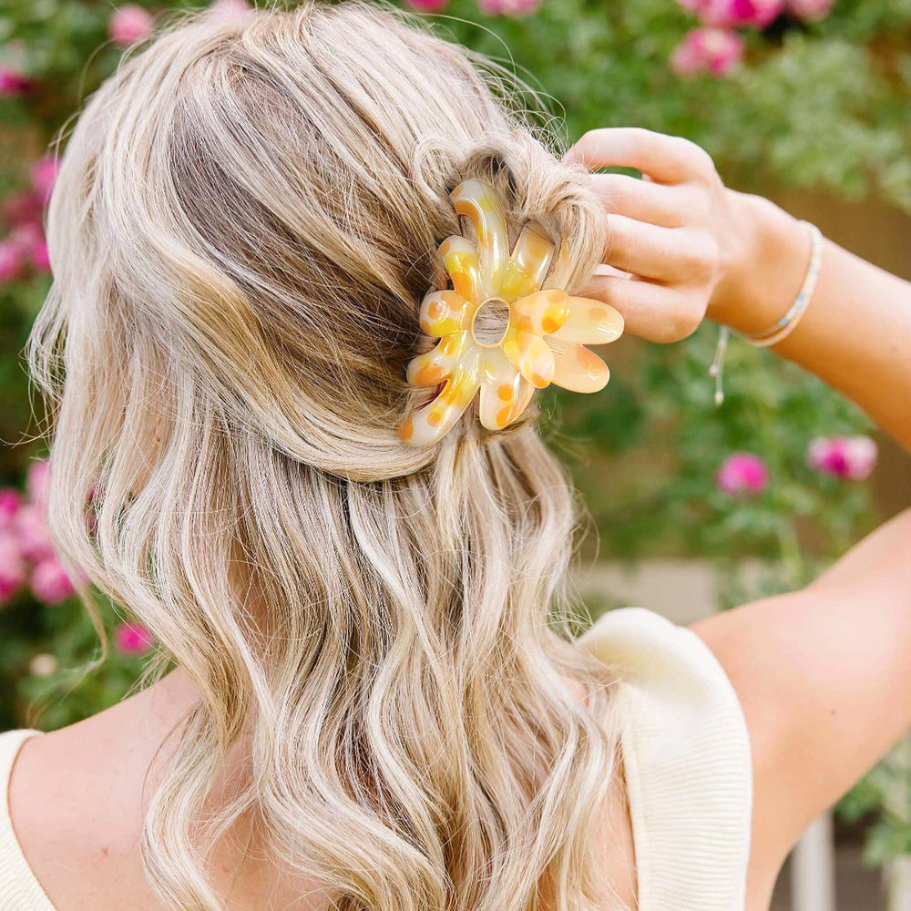 GQLV in use half-up hairstyle showing clip holding hair comfortably benefit: easy one-hand styling