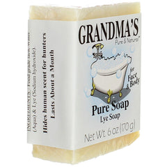 Grandma's Pure & Natural soap held in hand showing compact 6 oz size benefit