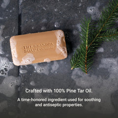 Grandpa Soap Company hand lathering the bar to show deep-clean benefit