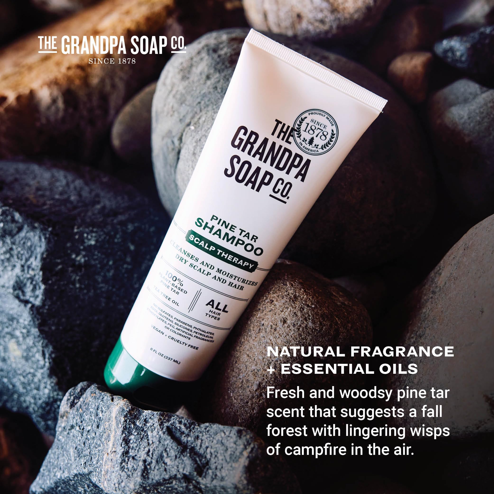 Hand holding Grandpa's Soap 8 fl oz tube to show size and portability benefit