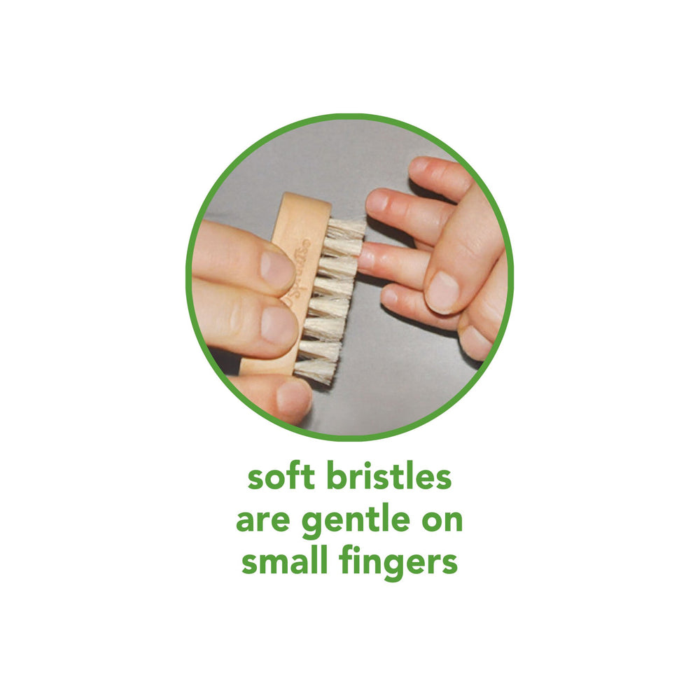 Green Sprouts brush in a nursery setting showing convenience for daily baby care
