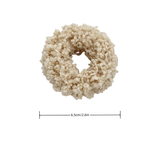 Grutyopkn plush fabric closeup showing soft texture and gentle hold