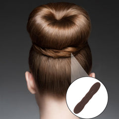 Gsbnjuy styled ballet bun in studio showing polished long-wear hold
