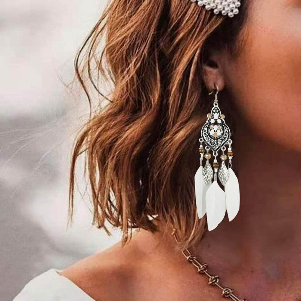 Gsoanrs earrings worn on model showing festival-ready style and bold look