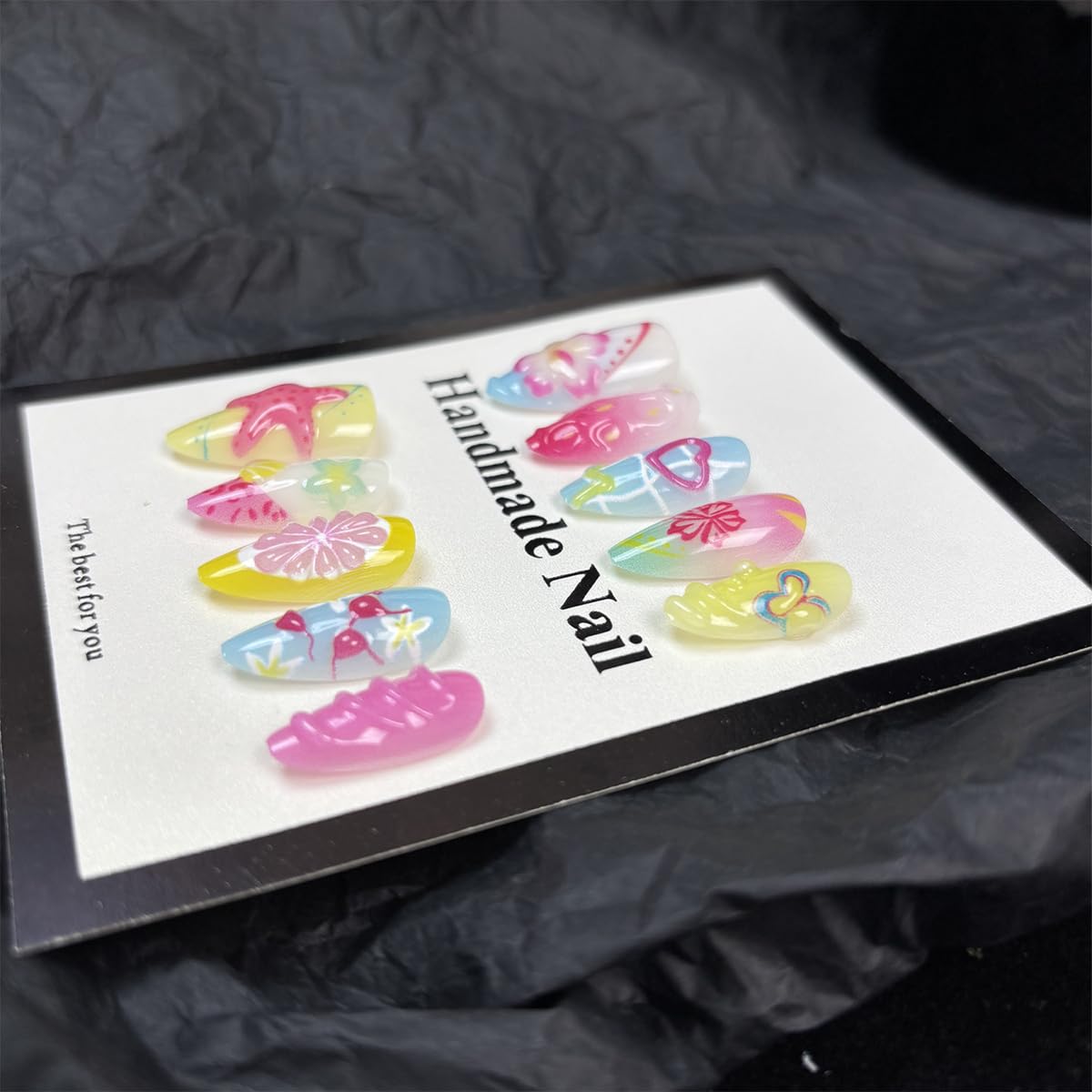 GUAACCB glossy nail surface demonstrating water-resistant finish that preserves color