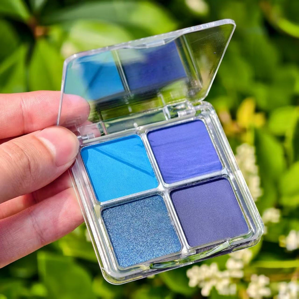 GUANTIAN held in hand to show compact size and easy portability