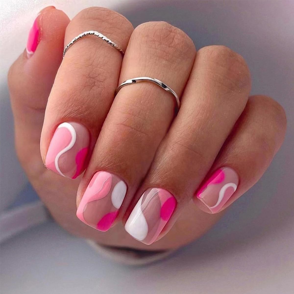 GUFUGU lifestyle shot of hands wearing mixed designs for an elegant event-ready look