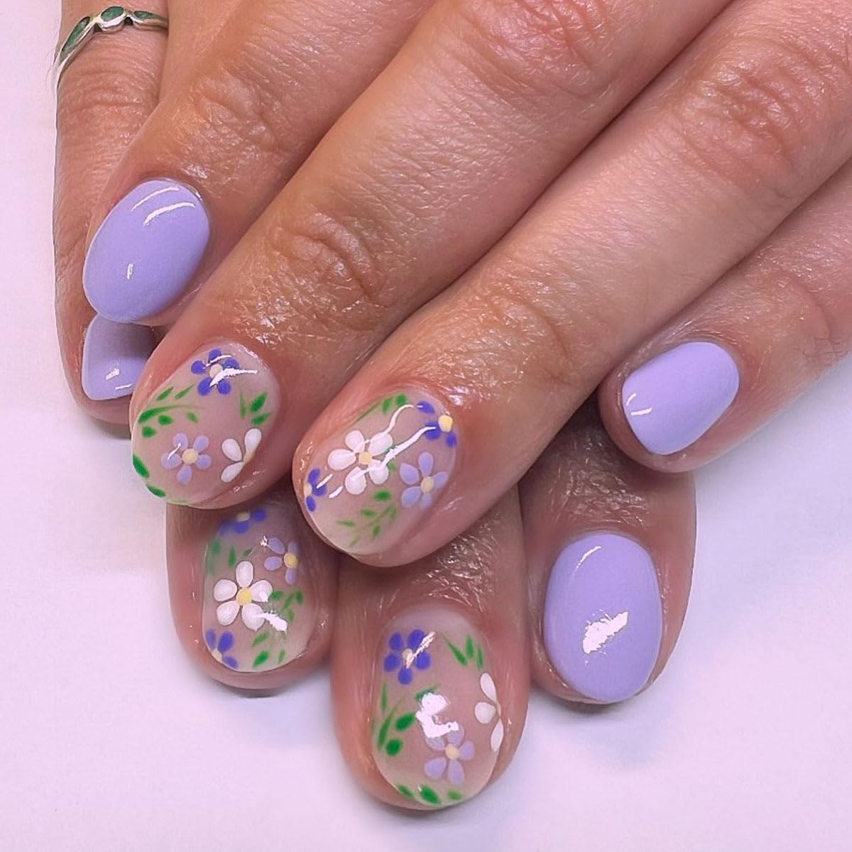 GUFUGU nails displayed on hand to show scale and flattering short square fit