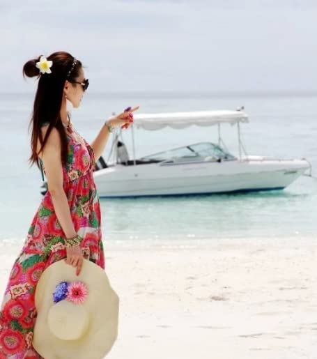 Guqqeuc plumeria clip styled in beach hair providing summery look and photo-ready charm