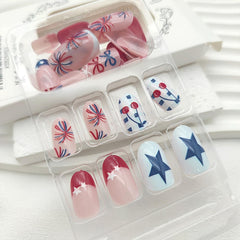 GXOIPNS applied nails on hands in patriotic setting highlighting instant holiday style