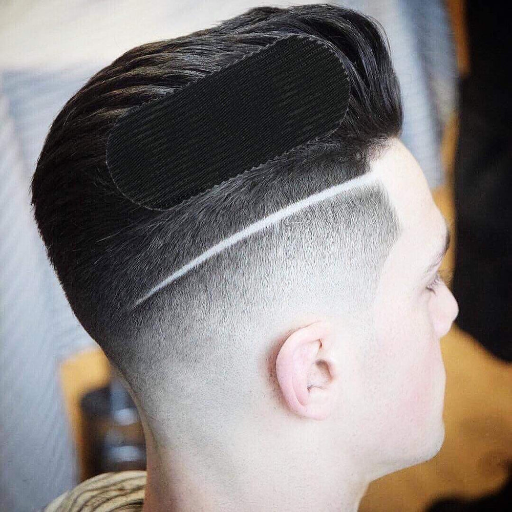HAIR GRIPPERS in hand demonstrating size and comfortable grip for quick styling