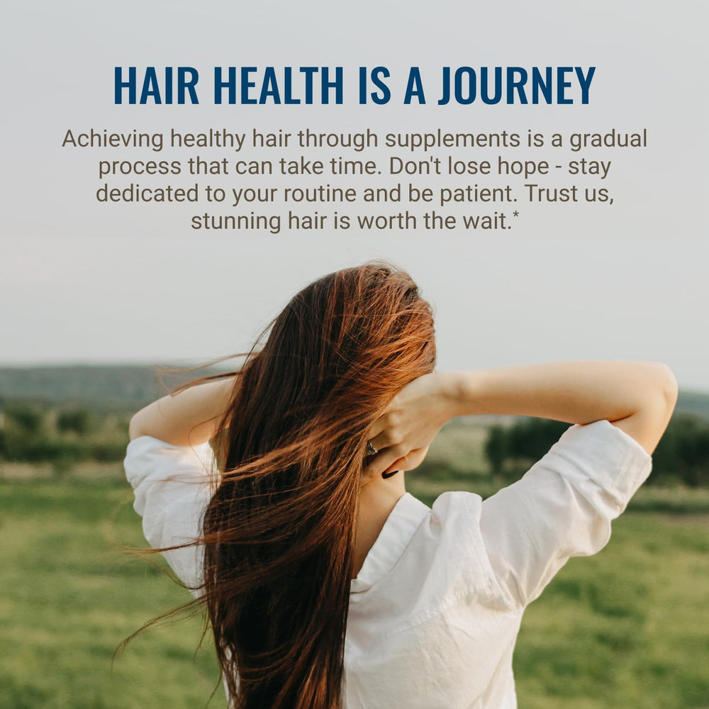 Hair La Vie bottle on a plant backdrop conveying natural botanicals and calm routine