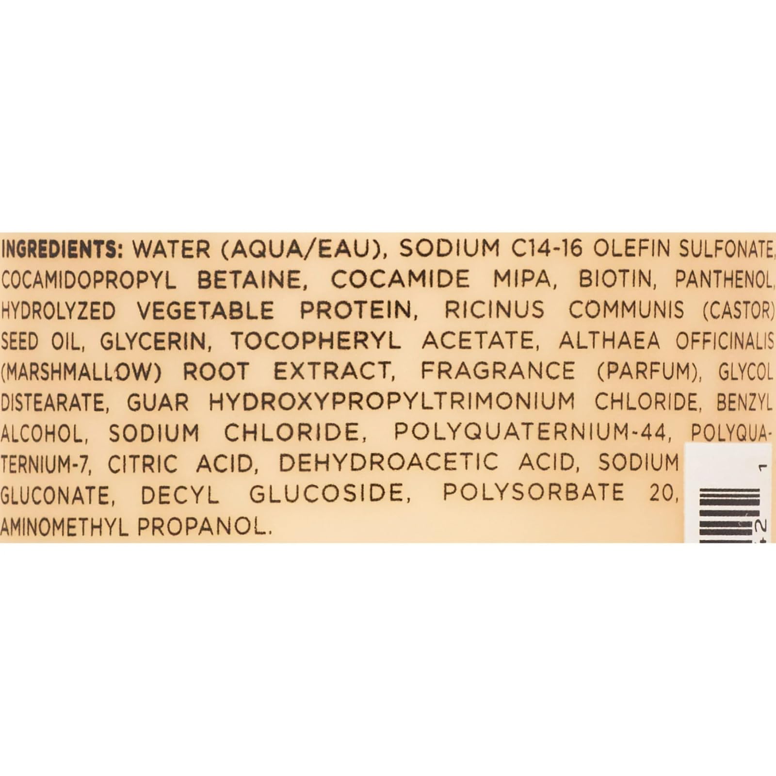 Hairitage bottle next to recyclable symbol and vegan badge highlighting ethical claims