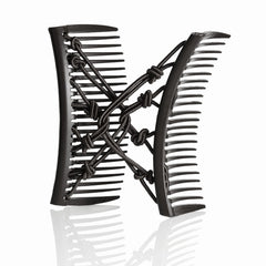 HairZing front view of Comfy Comb showing compact black design and secure hold