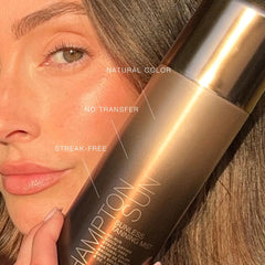 Hampton Sun fine mist in air demonstrating even no-rub application benefit