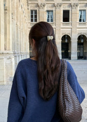 Hana Mia clip inside soft carrying bag showing travel protection and easy storage benefit