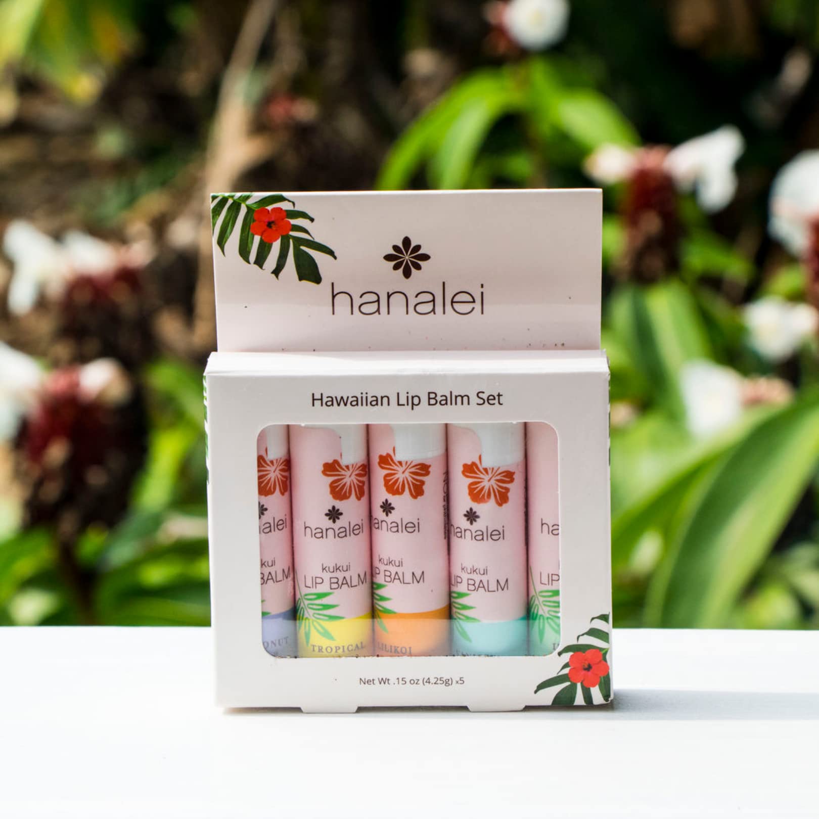Hanalei tube next to a coin for size comparison and pocket portability