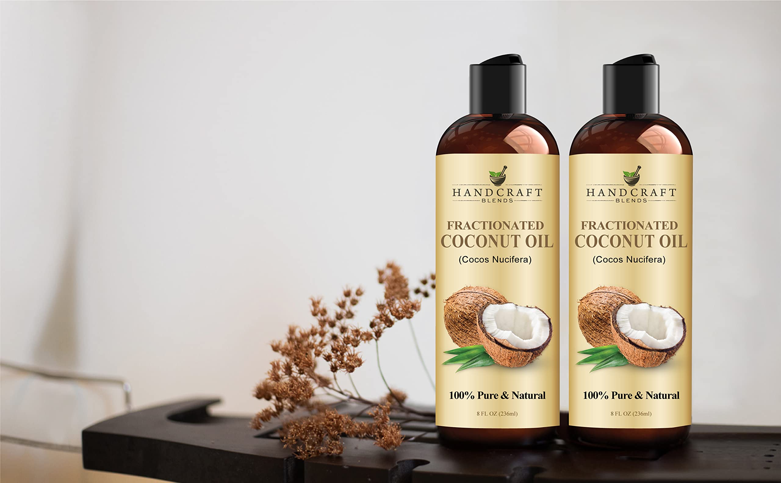 Handcraft Blends 8 fl oz bottle next to everyday objects illustrating compact, travel friendly size
