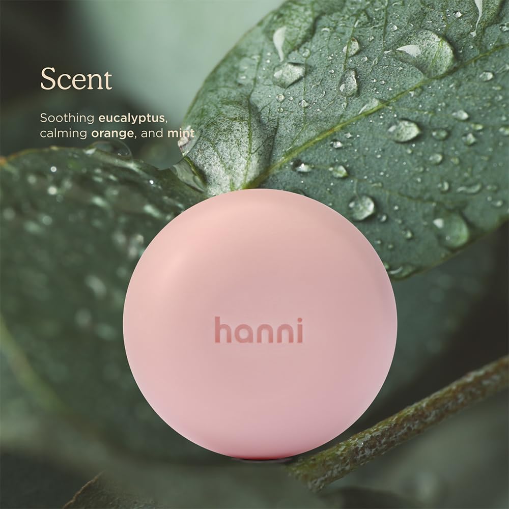 HANNI bottle packed with travel gear for on-the-go hydration