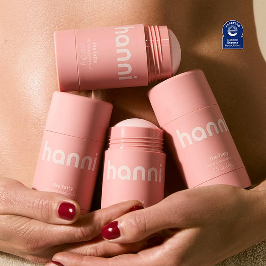 HANNI fatty open cap revealing smooth solid balm for easy application
