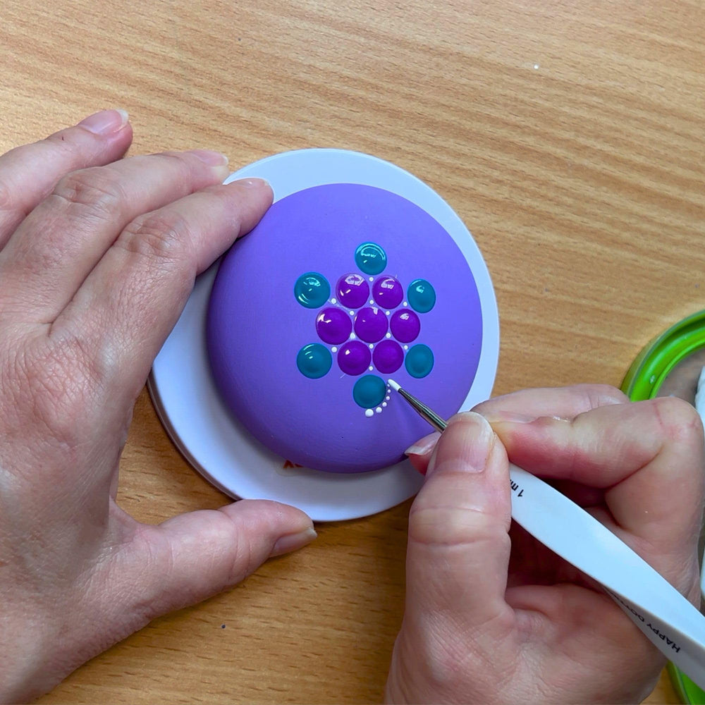 Happy Dotting Company stylus used on mandala showing micro dot centers and fine accents
