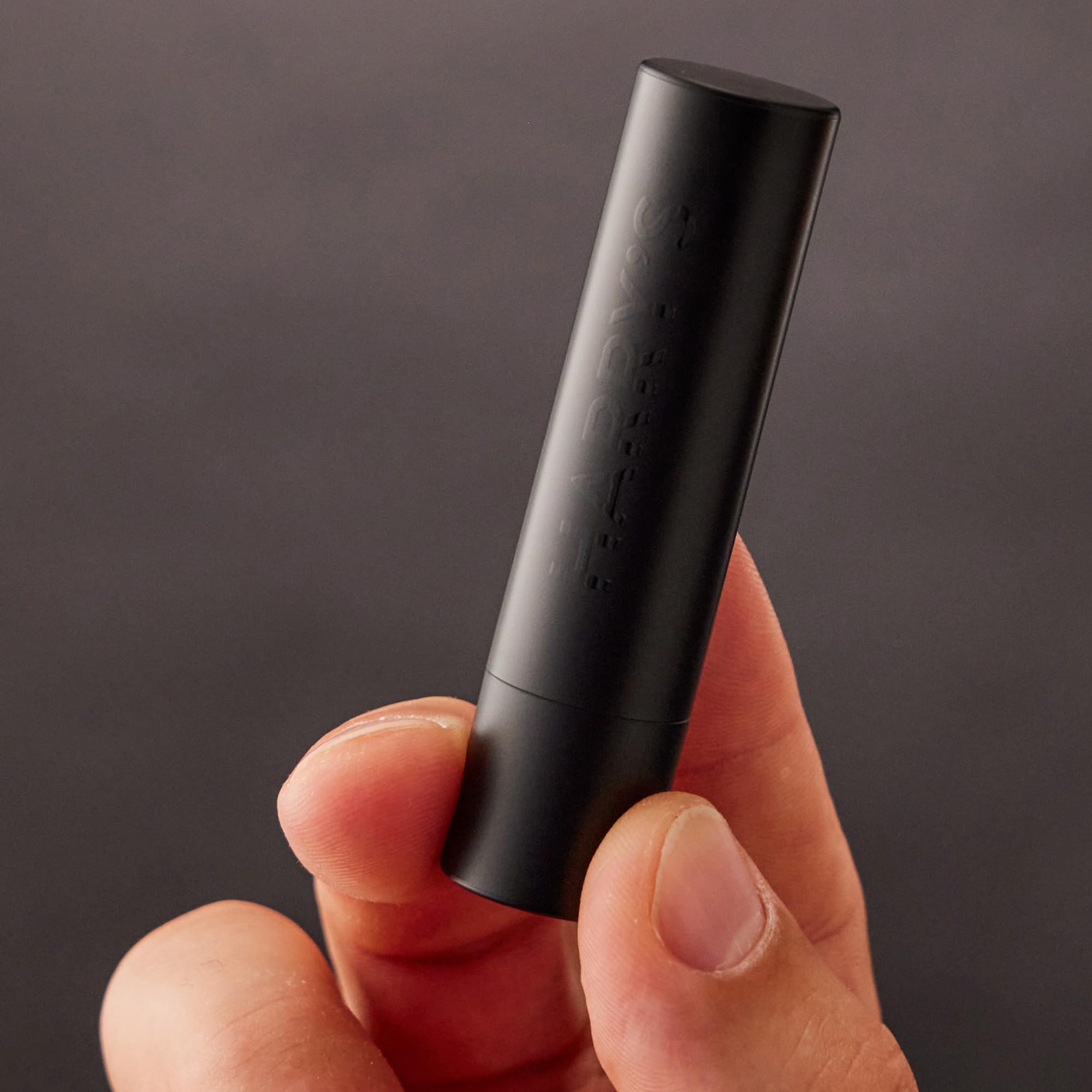 Harry's lip balm styled on shelf for minimalist lifestyle appeal and gifting