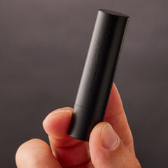Harry's lip balm styled on shelf for minimalist lifestyle appeal and gifting