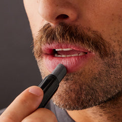 Harry's lip balm inside travel kit signaling portability and daily use readiness