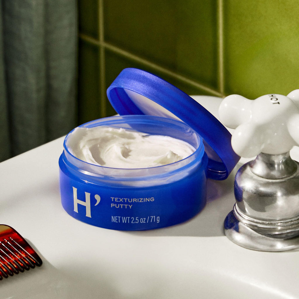 Harry's putty in a travel kit illustrating compact, carry-on friendly size