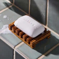Harry's bar lathered in hand demonstrating rich foam and cleansing